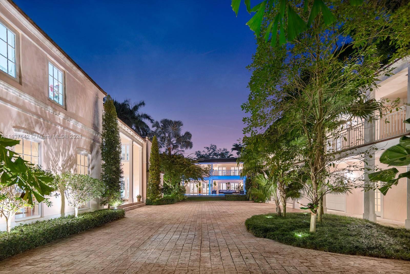 Unparalleled charm sophistication hallmark this one of a kind private compound offering 3 individual structures nestled in Coconut Groves most exclusive private, waterfront guard gated community, The Moorings.
