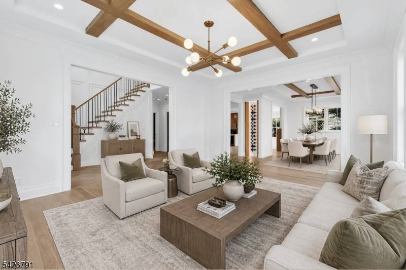 Welcome to this architecturally detailed modern 2026 custom home built from the foundation up in Chatham's highly coveted Upper Washington Ave section.