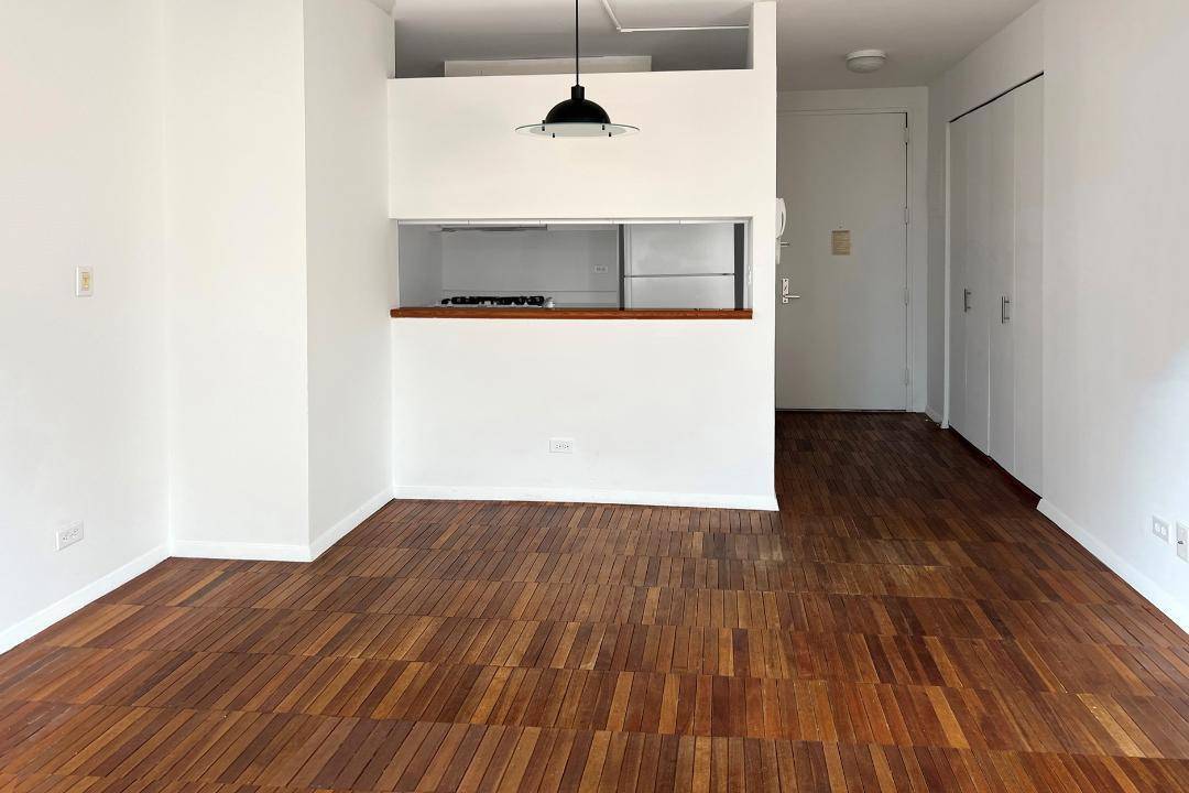 This very spacious, high ceiling alcove studio with 2 very large windows offering spectacular views on East 85th street, located on the 9th floor of a full service Upper East ...