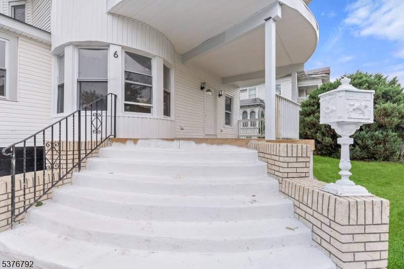 Welcome to 6 White Terrace, a beautifully renovated and majestic Colonial style home tucked away on a quiet residential block in Newark.