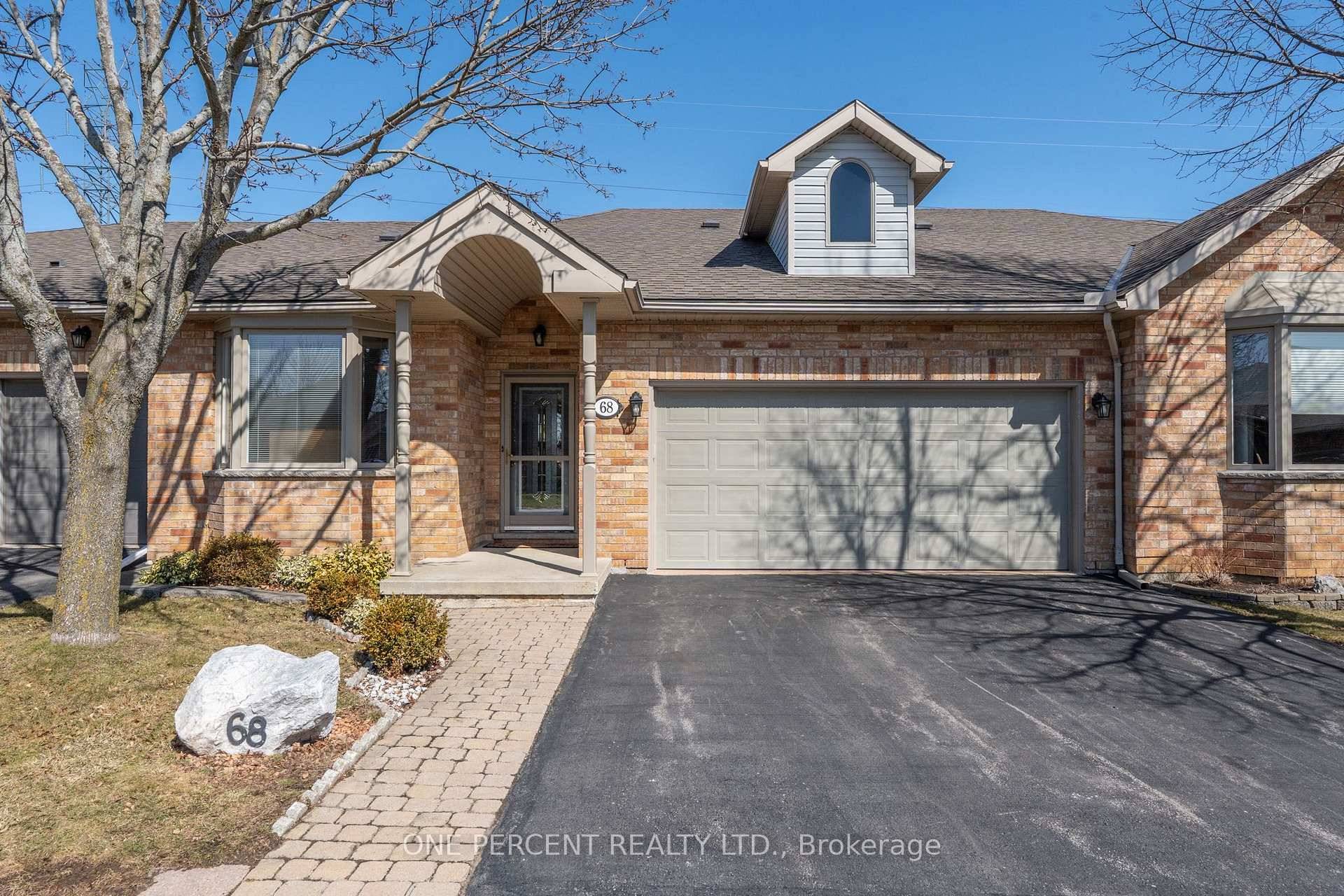 Located in desirable Twenty Place Community this fantastic 2 1 bedroom, 3 bathroom bungalow with double garage is available immediately !