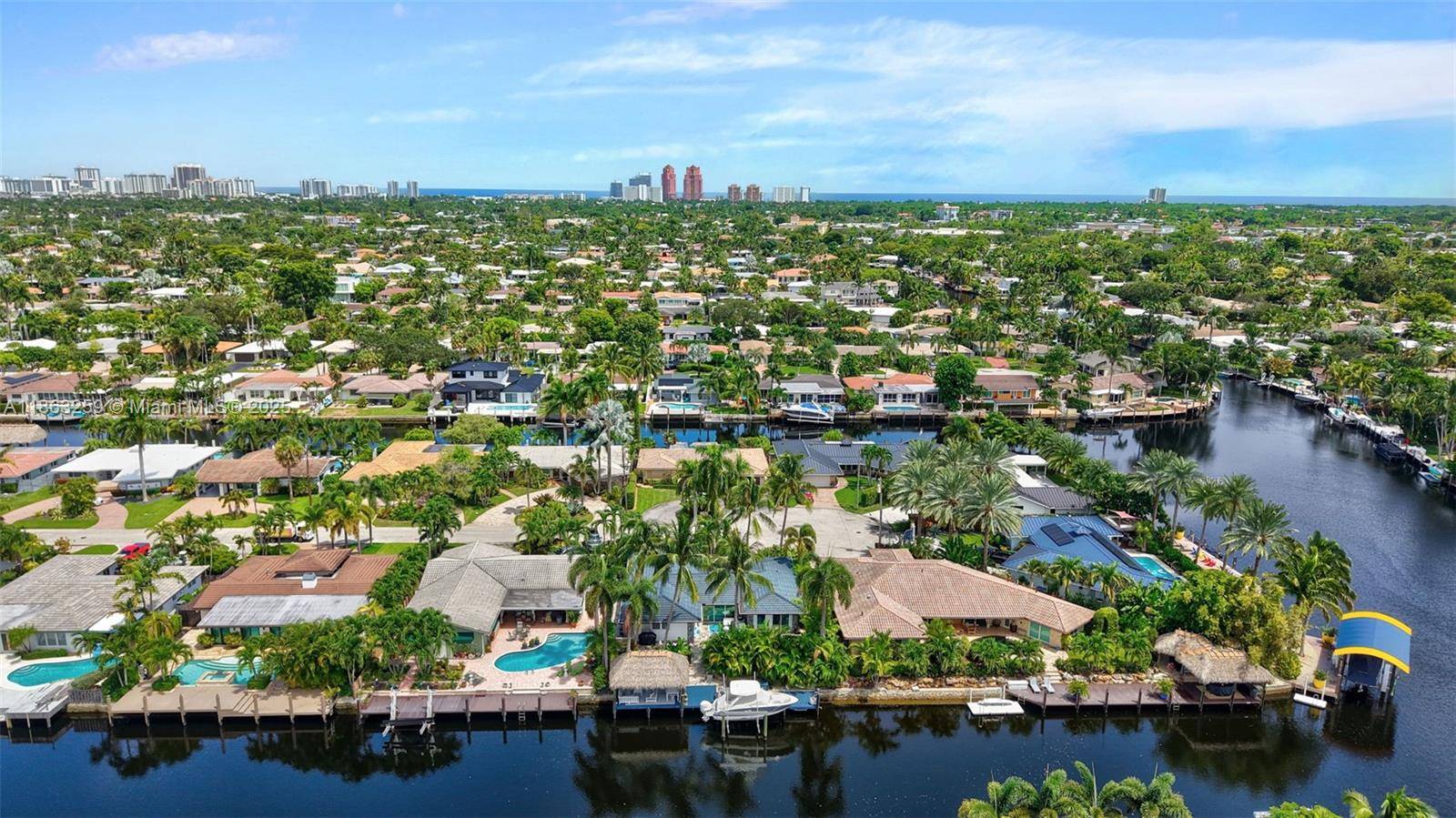 Tropical Waterfront Retreat in Wilton Manors with ocean access just minutes to Port Everglades Inlet.