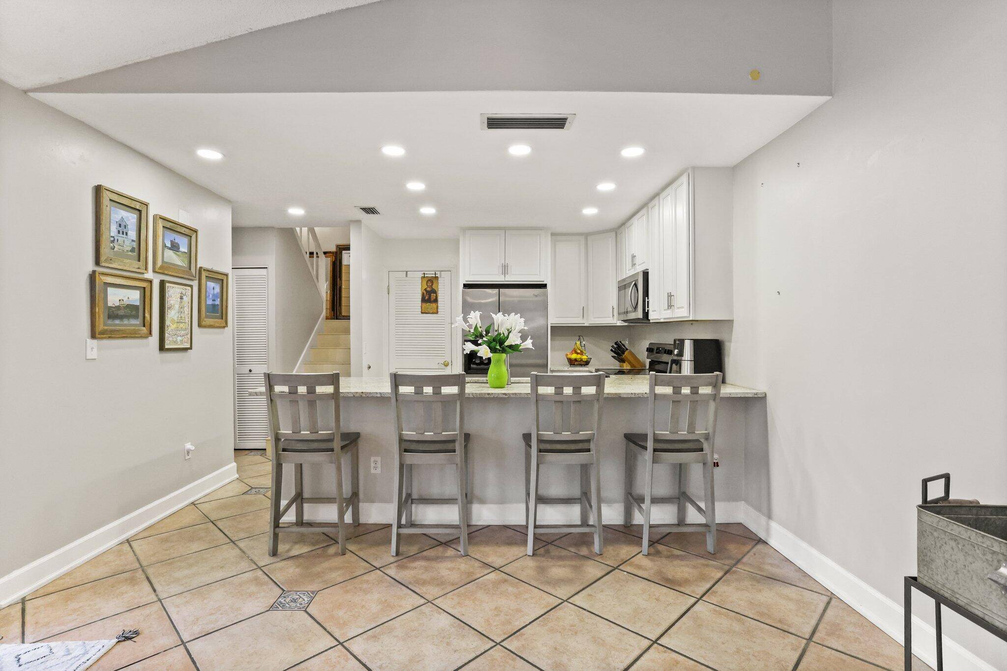 Welcome to 4652 Holly Lake Dr, a beautifully updated 3 bedroom, 2 bathroom townhome located in the heart of Lake Worth.