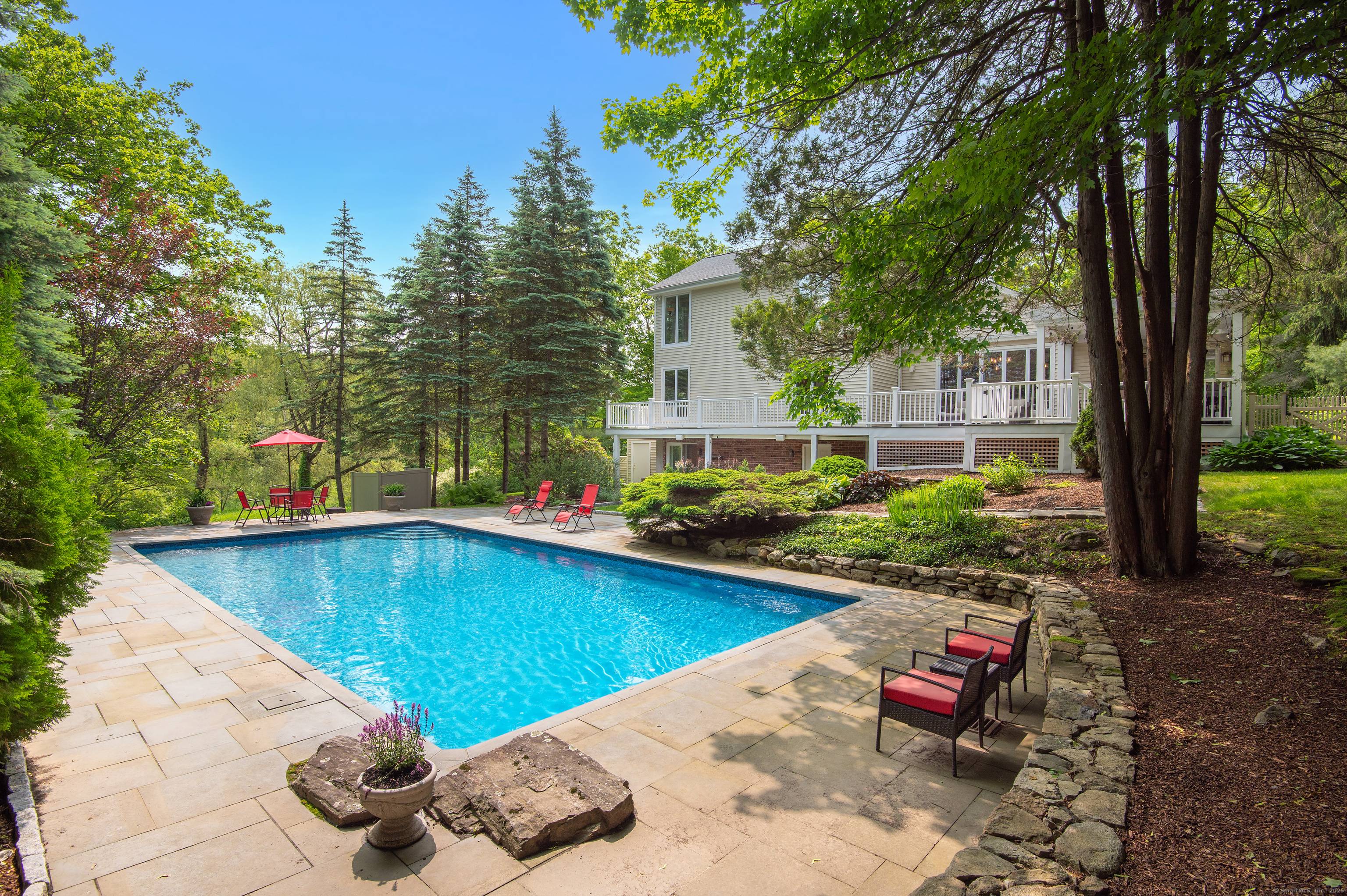 Prime Main Street Location Stunning transitional style Cape Cod residence tucked down a private lane in one of Ridgefield's most desirable in town locations.