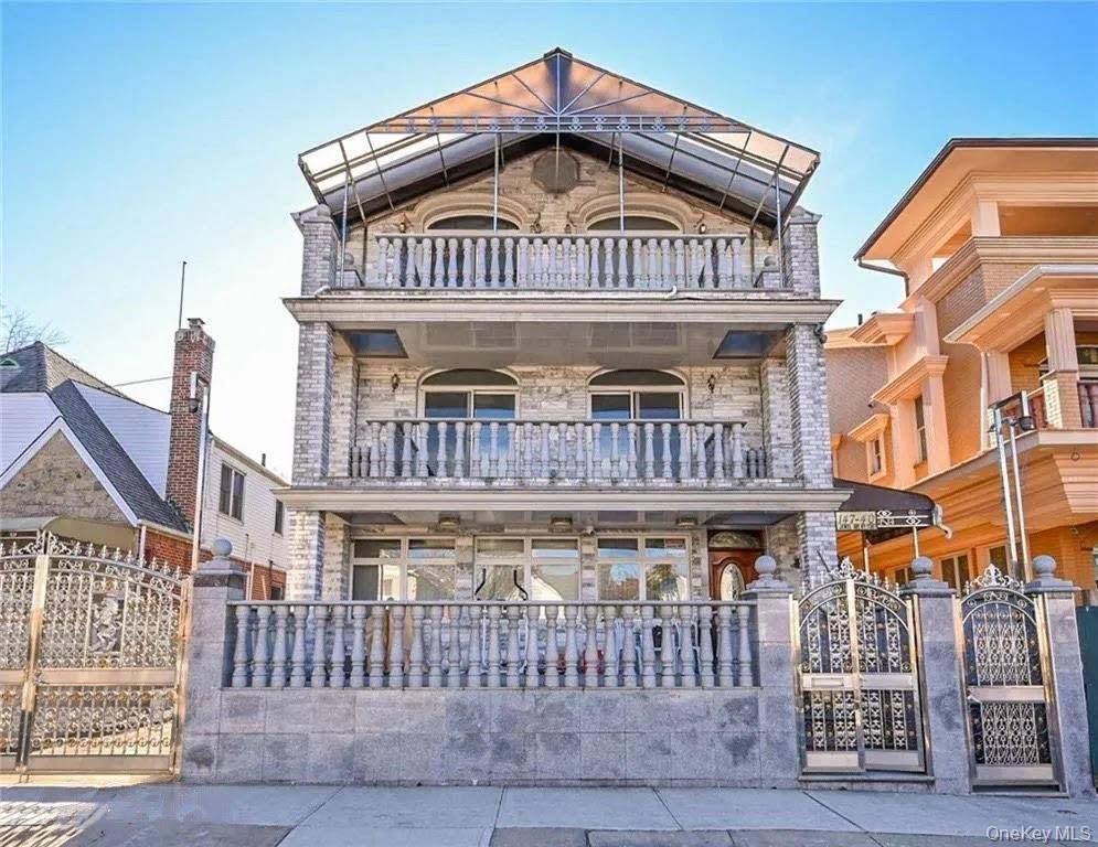 This exceptional all brick multi level residence sits on a 40x100 lot with a 25x60 building footprint, showcasing quality construction and thoughtful design throughout.