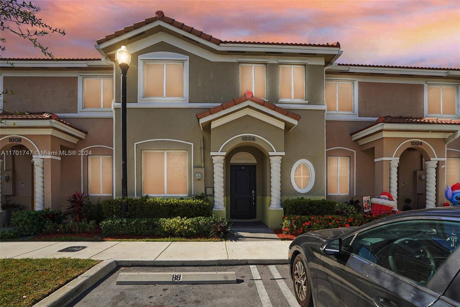 This stunning 4 bedroom, 3 bath home, built in 2021, is located in one of Homestead s top gated communities.