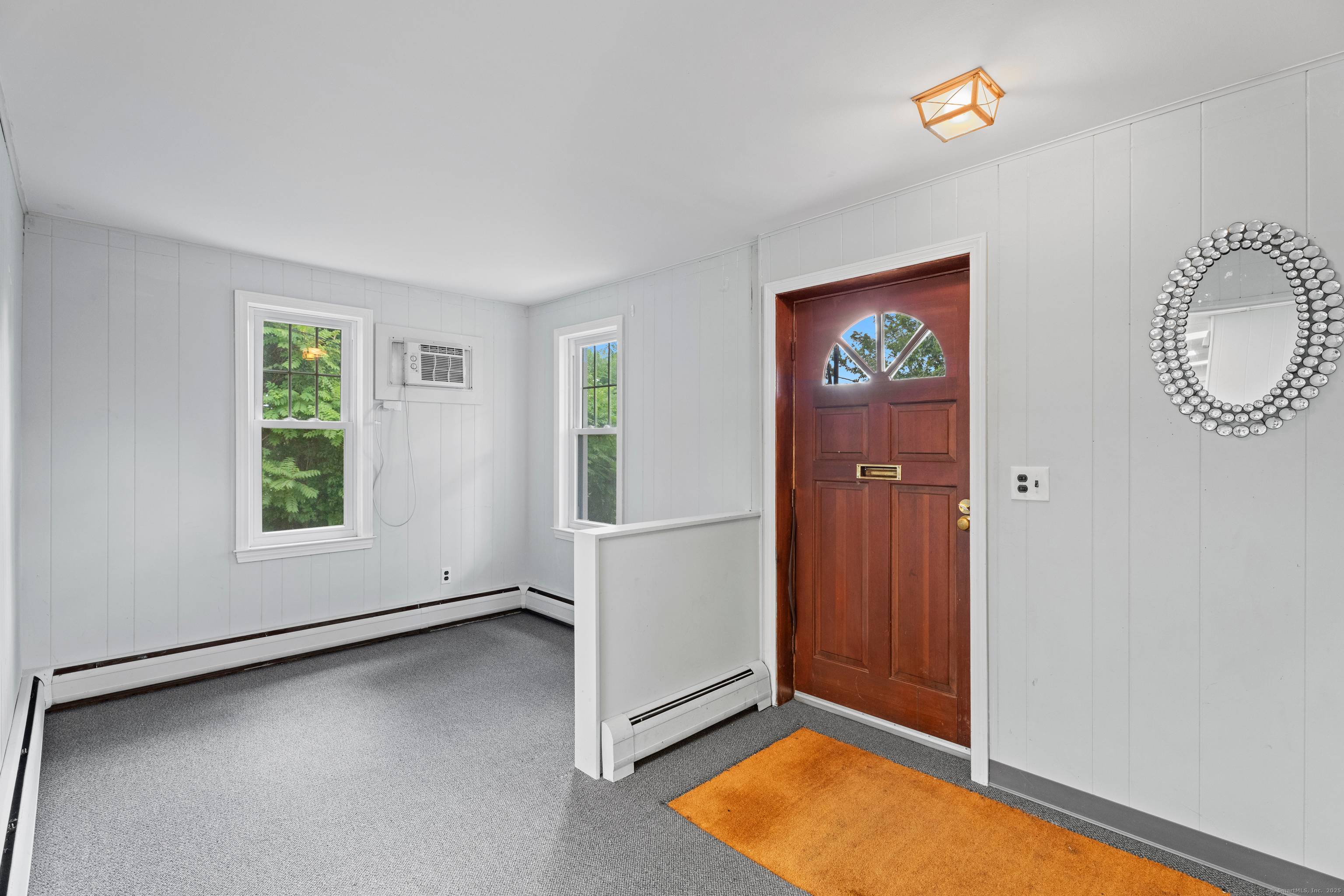Welcome to 2764 Whitney Avenue a unique and spacious property offering endless possibilities in a prime location !