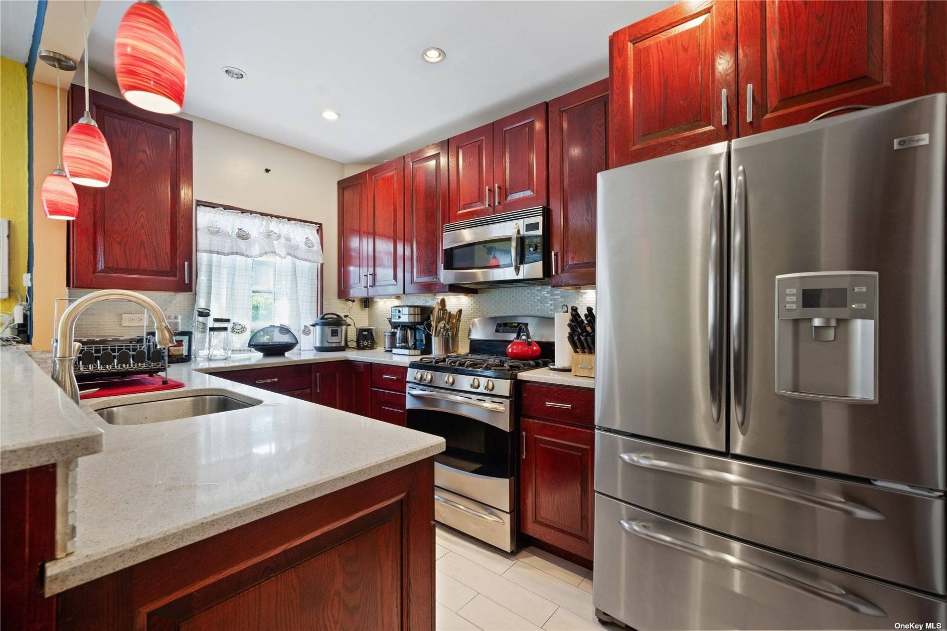 Step into 33 21 70th Street, nestled near the Historic District in Jackson Heights, and discover a charming row style home on a serene tree lined street.