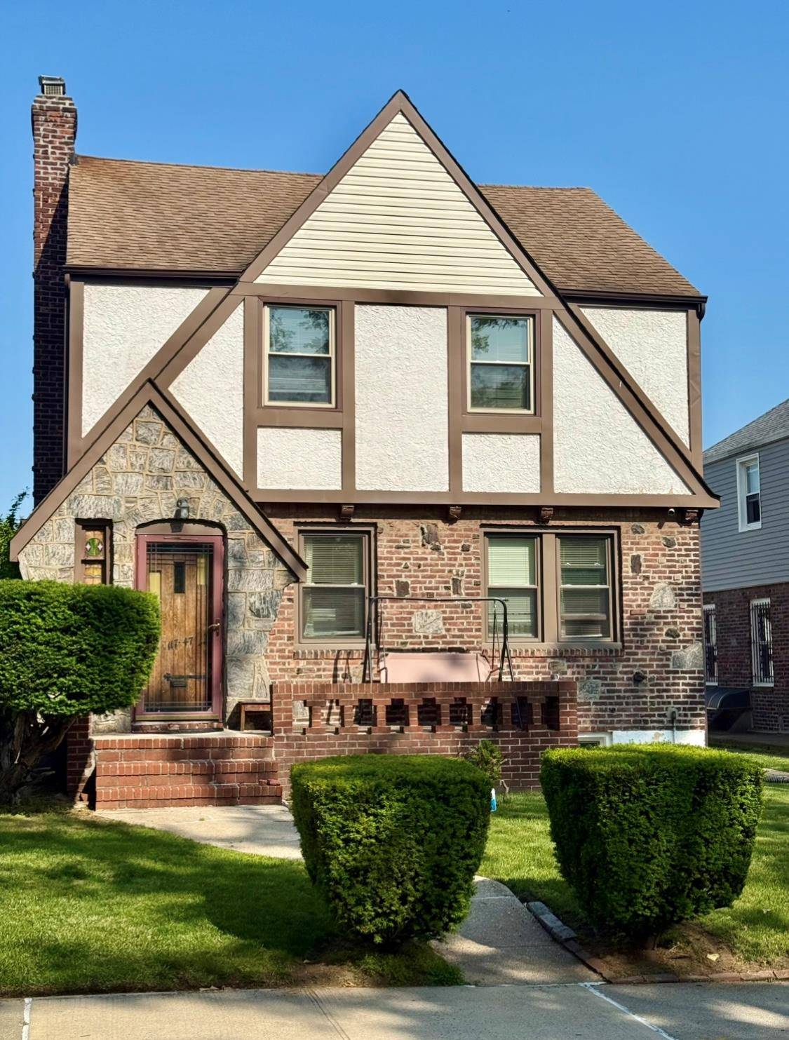 Spacious Tudor Style Home on Wide lined Street in Cambria Heights !