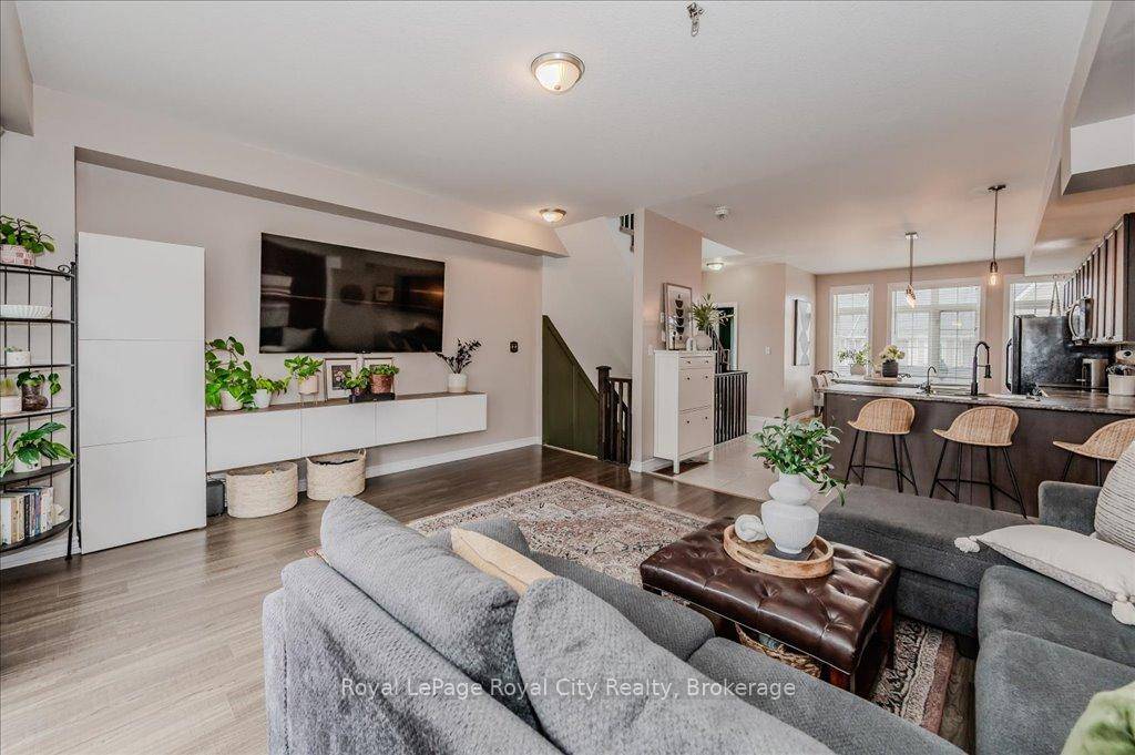 Welcome to this beautifully designed FREEHOLD, end unit townhouse offering nearly 1, 800 sqft of modern living space in one of East Galt's most desirable and convenient neighbourhoods.