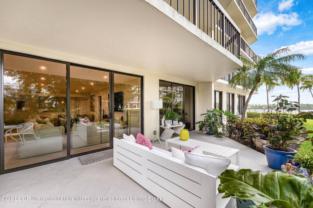 Exceptional coastal living in this spacious, redesigned 2BR 2BA residence with a large lanai offering tranquil Intracoastal and garden views.