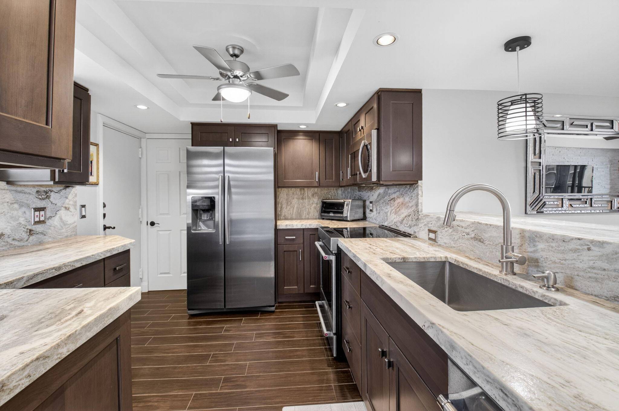 BEAUTIFULLY RENOVATED 3 BEDROOM, 2 BATH UNIT ON 4TH FLOOR WITH DESIRED EAST EXPOSURE.