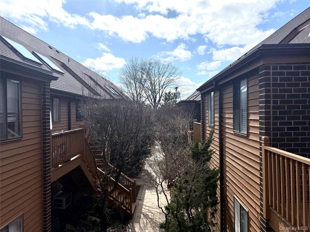 Imagine stepping into a beautifully remodeled duplex loft in White Plains that effortlessly marries urban chic with cozy warmth.