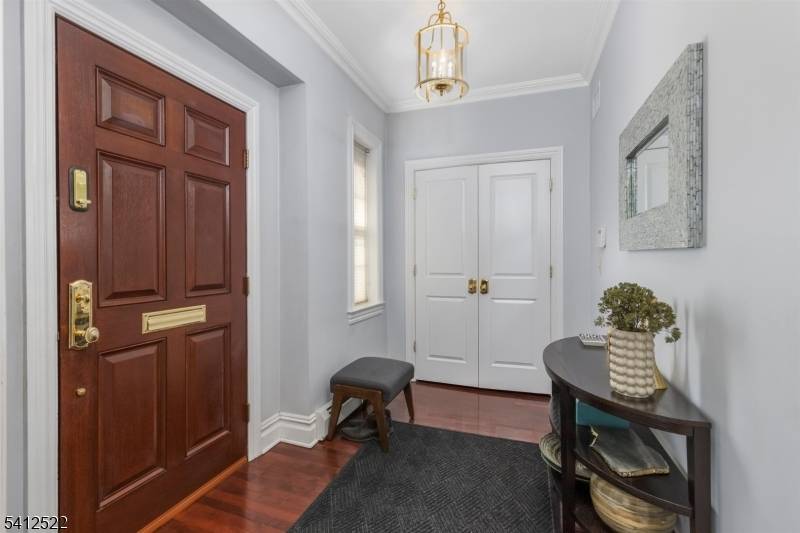 Situated on a quiet cul de sac, this impressive brick home is meticulously maintained and offers a balance of style and practicality.