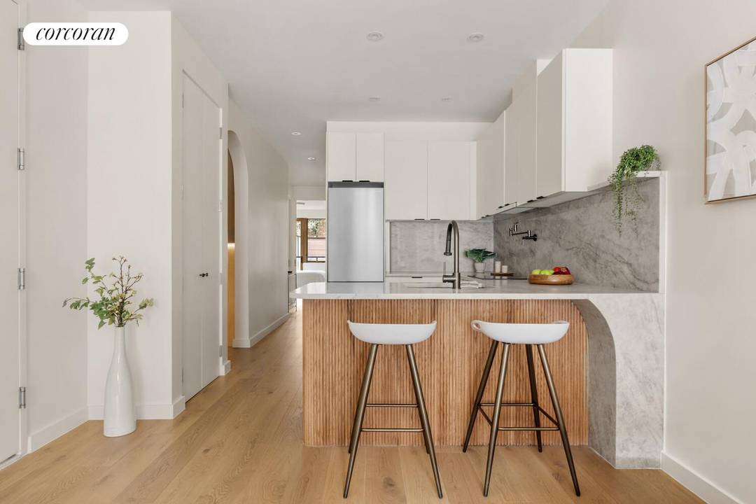Welcome to Residence 1 at Sterling Curve, a generously scaled two bedroom, two and a half bath home offering a rare blend of indoor volume, layered outdoor spaces, and thoughtful ...