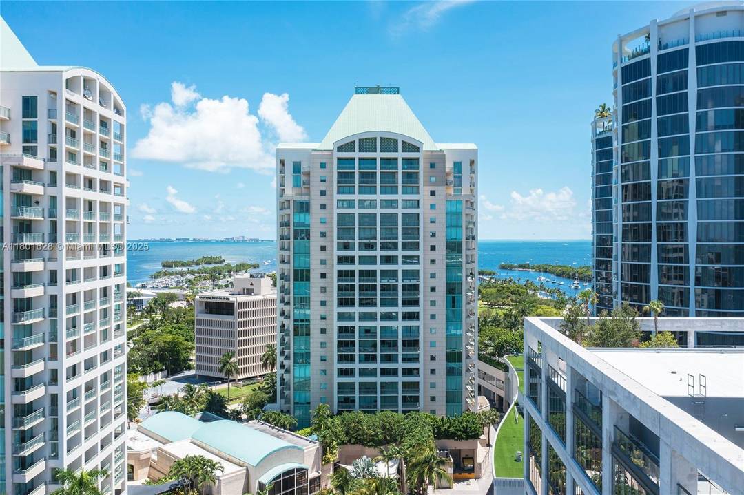 Large corner unit with water and city views at the exclusive Ritz Carlton Residences in the heart of Coconut Grove across from Biscayne Bay and Regatta Harbour.