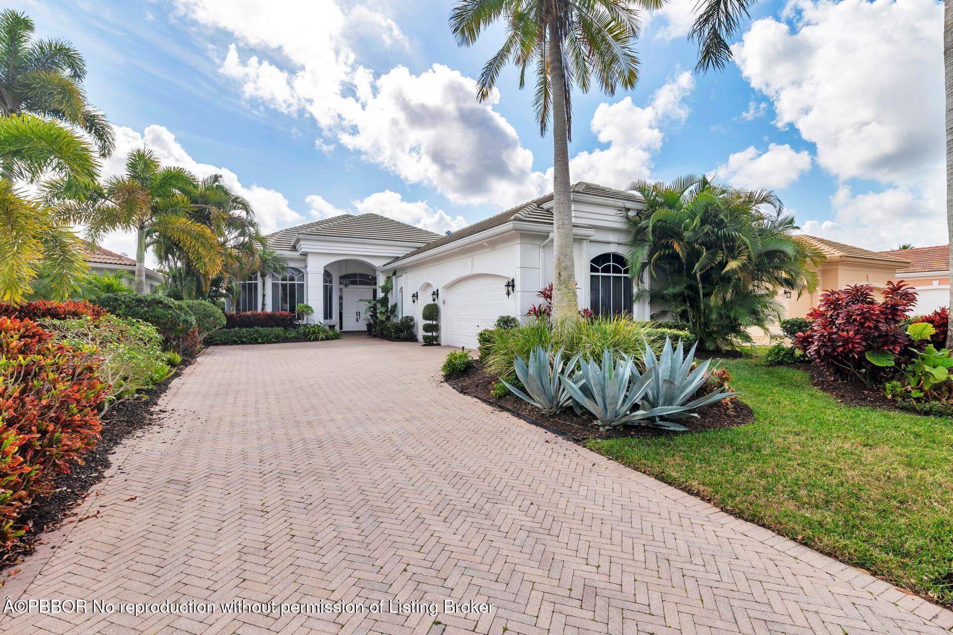 Mediterranean style home features 3BR 4FB, along with screened in lanai pool and picturesque golf course views.