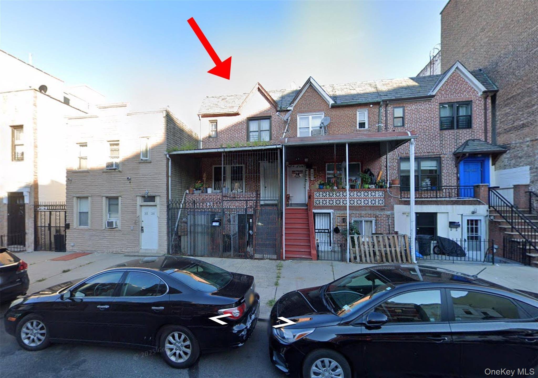 Legal three family brick triplex located in prime Astoria.