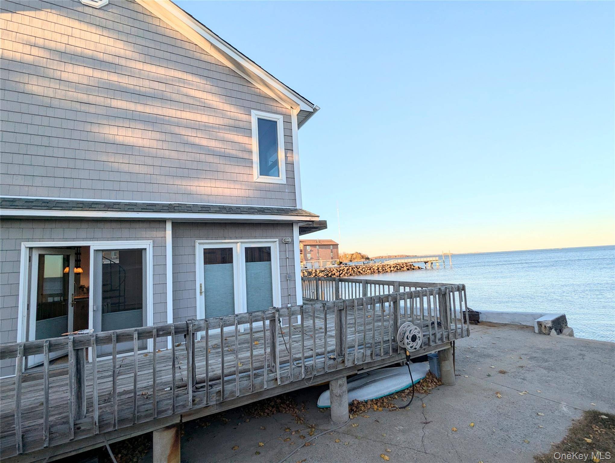 A once in a lifetime STUNNING WATERFRONT single family house rental positioned right on the water of a 3 homes property lot on the lovely City Island !