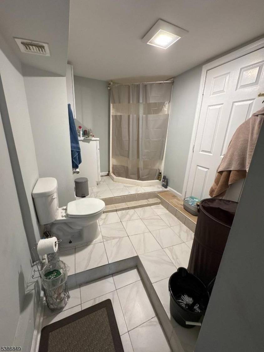 Turnkey 3 Unit Property with 2 Car Garage This well maintained 3 family property offers a strong income producing opportunity with 6 total bedrooms and 3 full bathrooms.