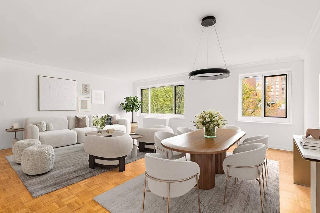 This large two bedroom, two bath one en suite condo has an open kitchen living dining plan and is in move in condition.