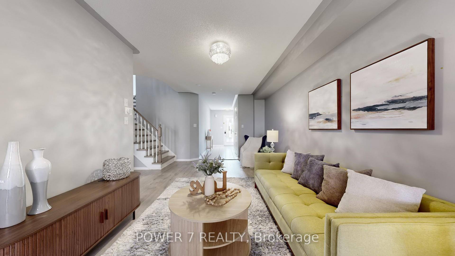 Welcome to this bright and spacious freehold NO POTL FEE townhouse, approx.