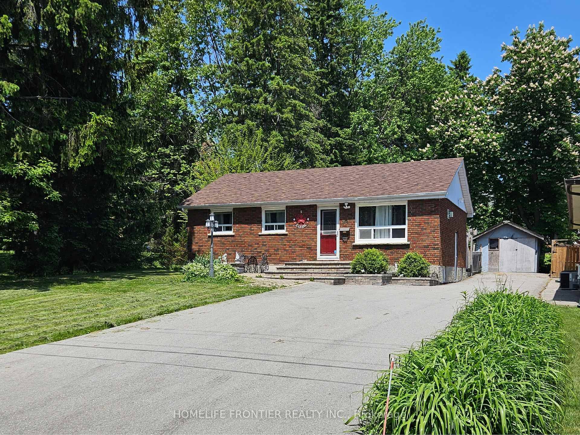 Experience lakeside living in this exquisite brick bungalow, on a 50x150 lot, steps from Lake Simcoe, beaches, Keswick residents' park, boat launch, amp ; dock.