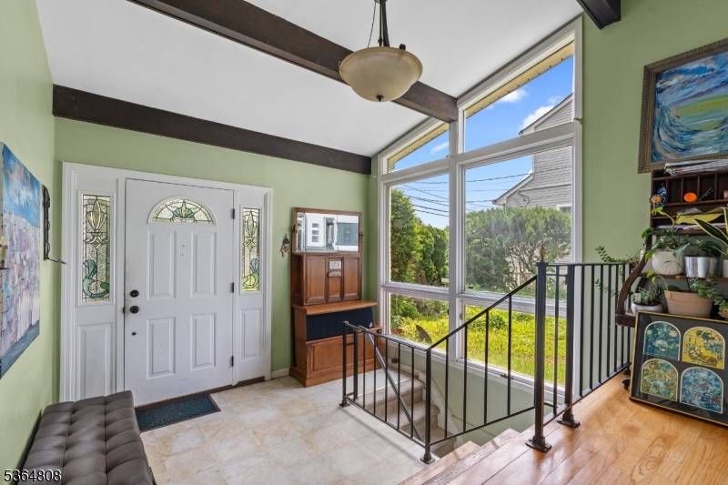 Welcome to this charming ranch style home located in an extremely desirable neighborhood, directly across from a beautiful park with tennis courts.