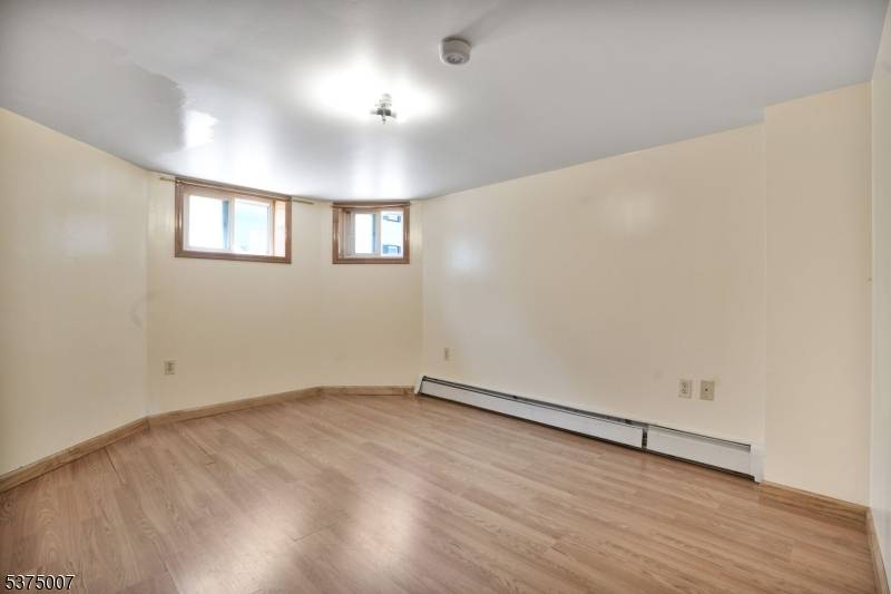 Move in condition 3 family home with update bathrooms and completely finished basement.