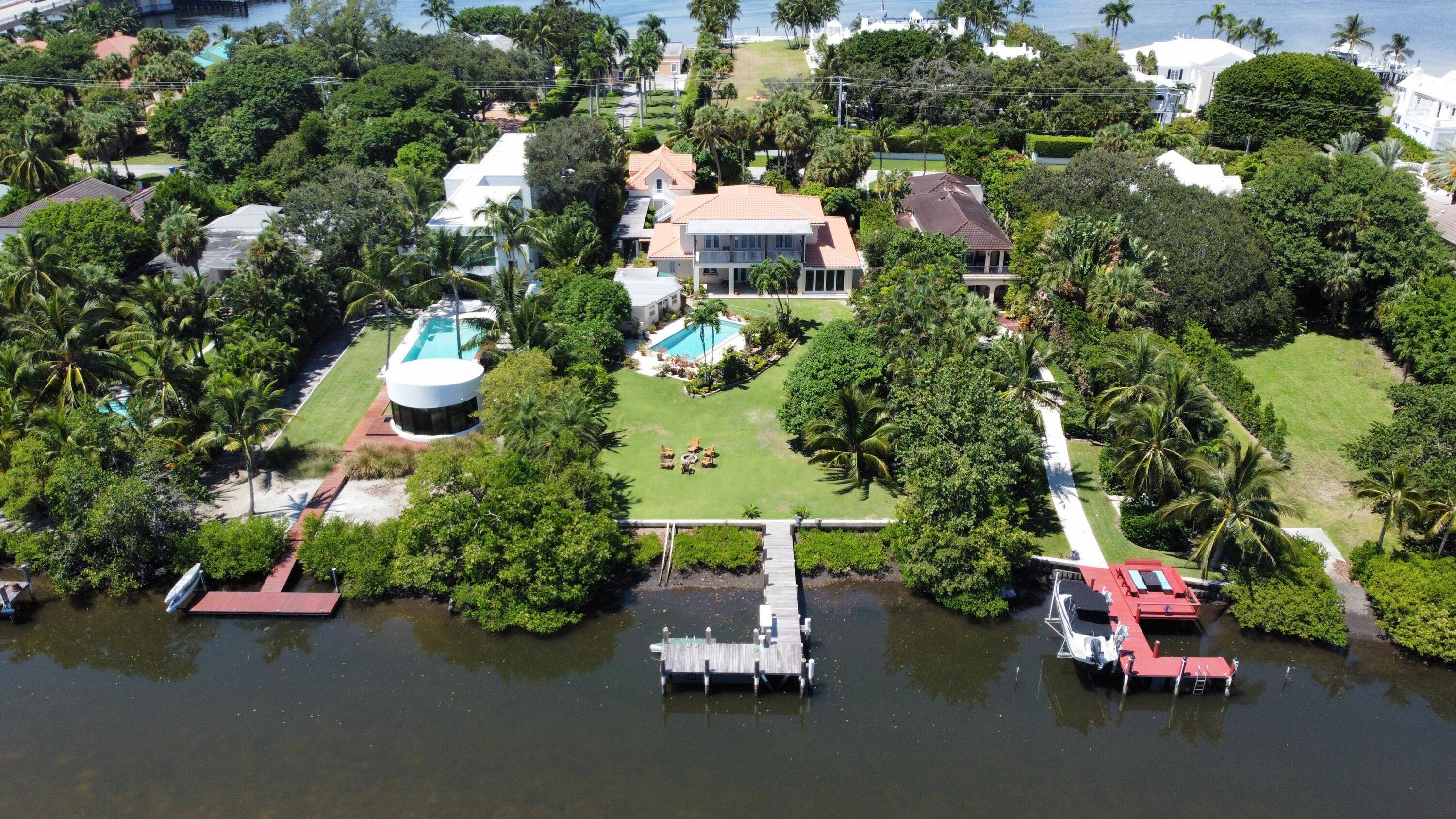 Enjoy peace, privacy, and the ocean breeze from this sprawling 5 bedroom waterfront estate.