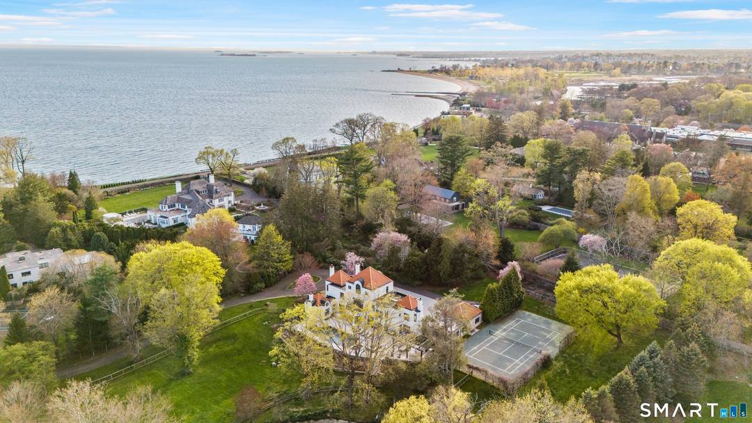 Set behind gates on over four exquisitely landscaped acres in Westport's coveted Beachside enclave, 69 Beachside Avenue is a private coastal estate offering a rare blend of scale, privacy, and ...