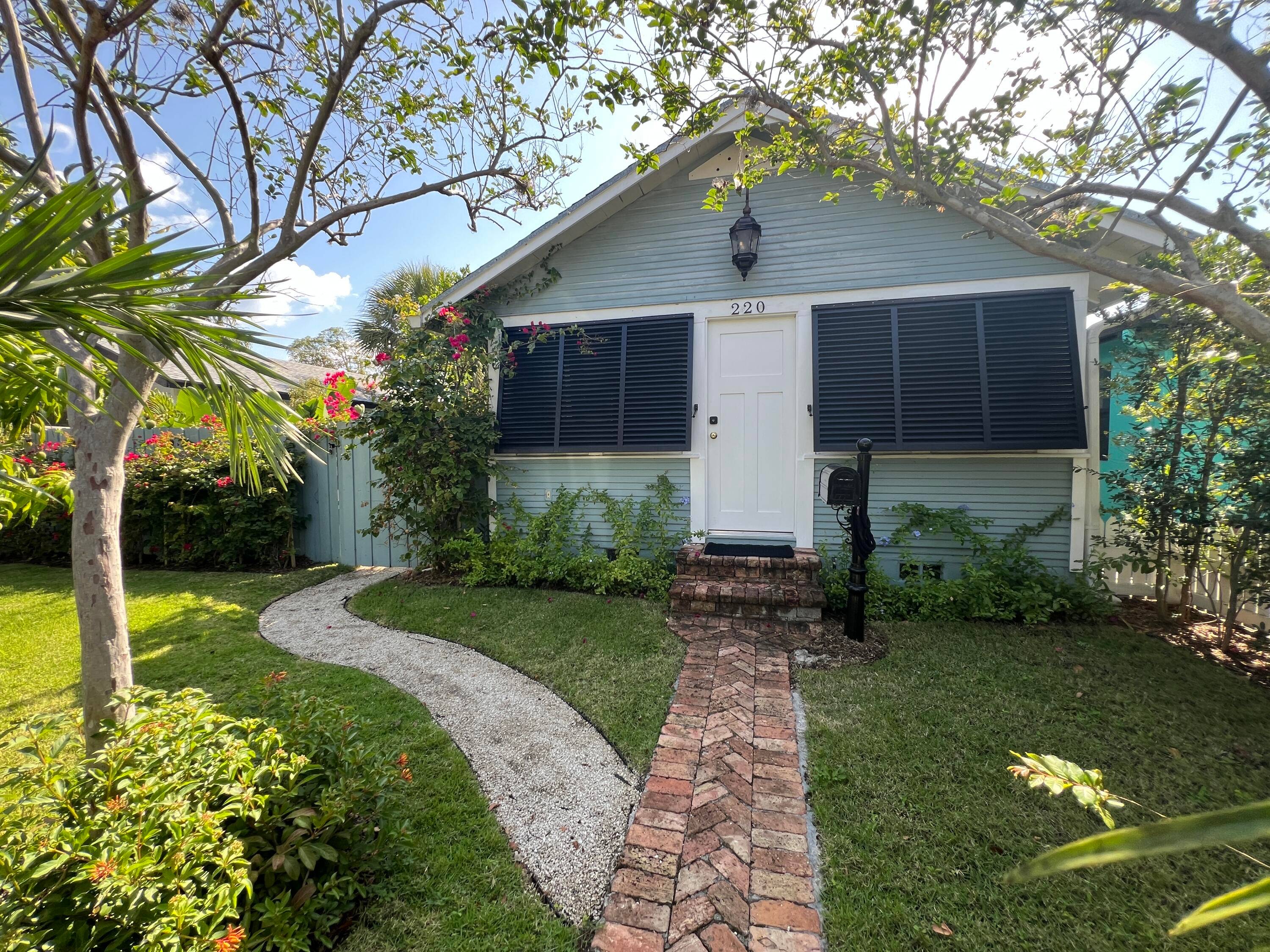 Renovated 1928 Craftsman style 2 BD 1 BA historic home with a brand new 2025 construction 1 BD 1BA guest cottage on beautifully landscaped 50' x 135' lot just 2 ...
