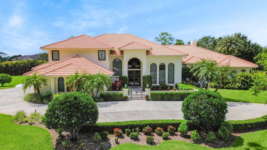 Estate home located in the prestigious community of PGA Village.