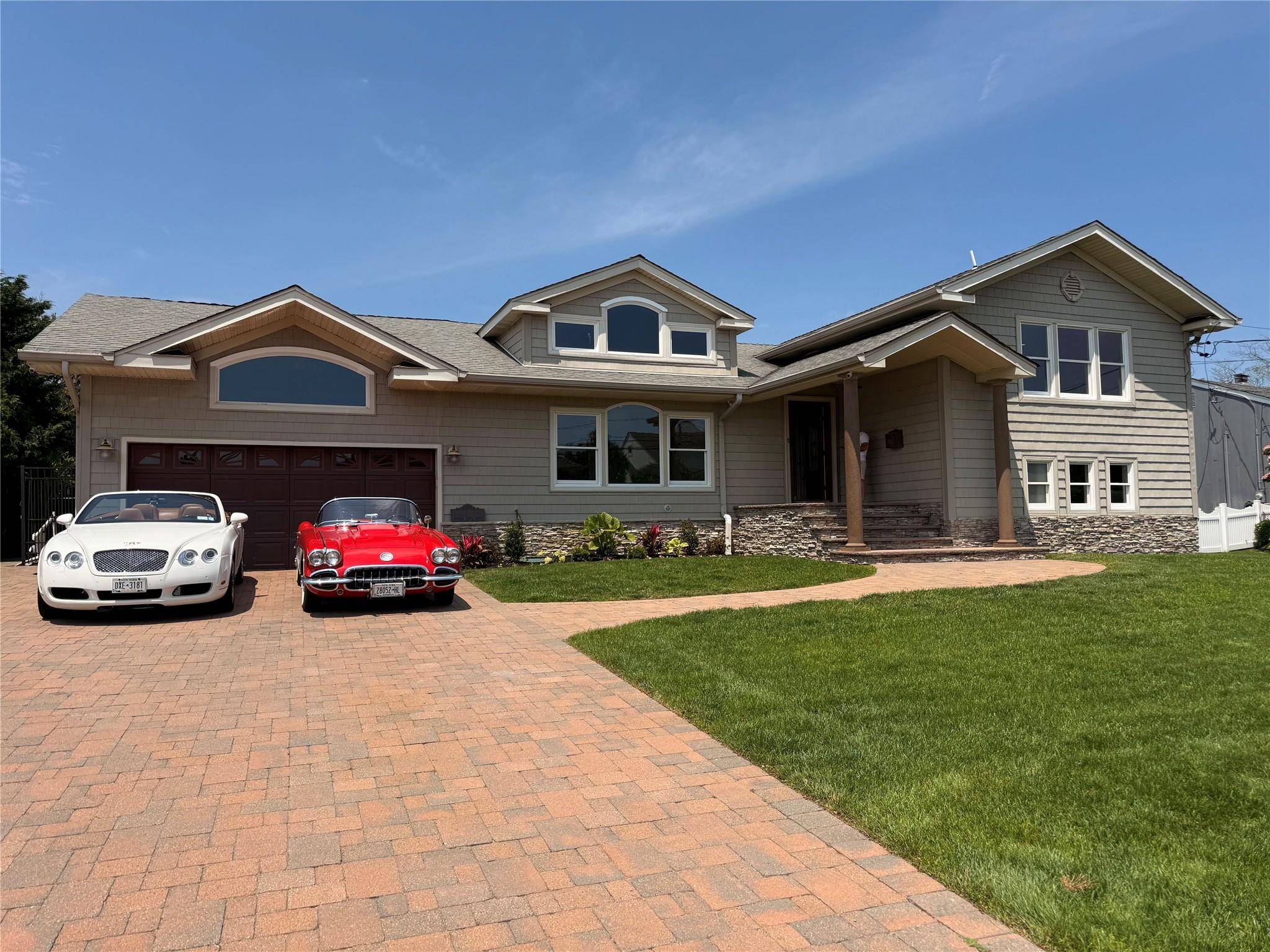 Prestigious Waterfront Living in Harbor Green, Massapequa Welcome to your dream home in the heart of Harbor Green, Massapequa s most coveted waterfront community.