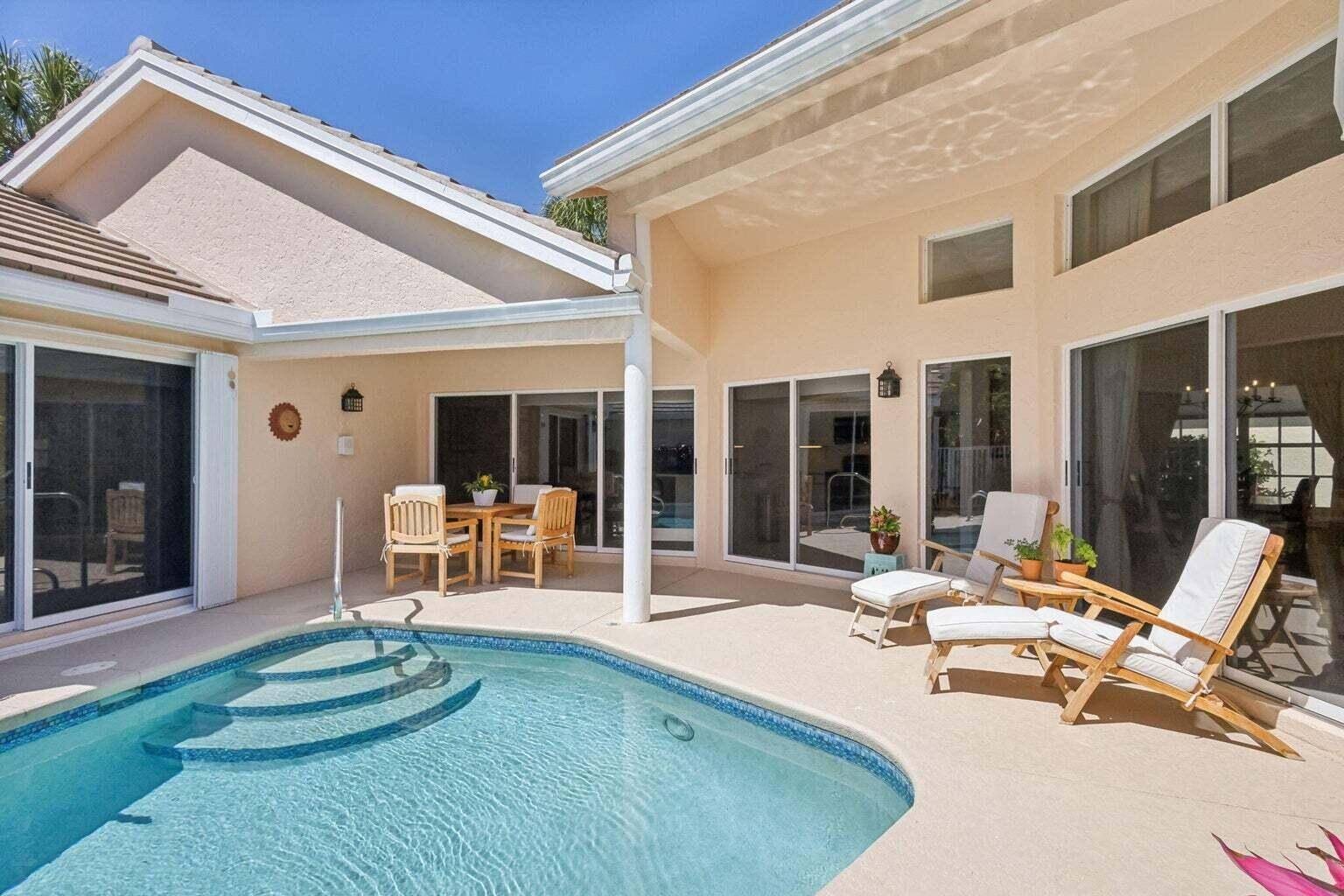 Nestled within the exclusive Riverwind community, this rarely available single family home Jonathans Landing presents an unparalleled opportunity.
