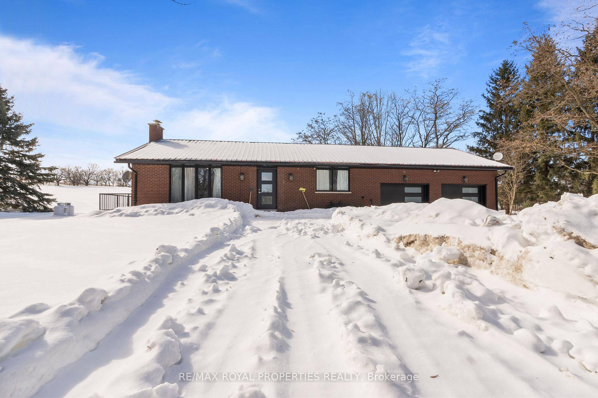 Stunning Fully Renovated Bungalow With Steady Monthly Income on 10 acre Parcel !