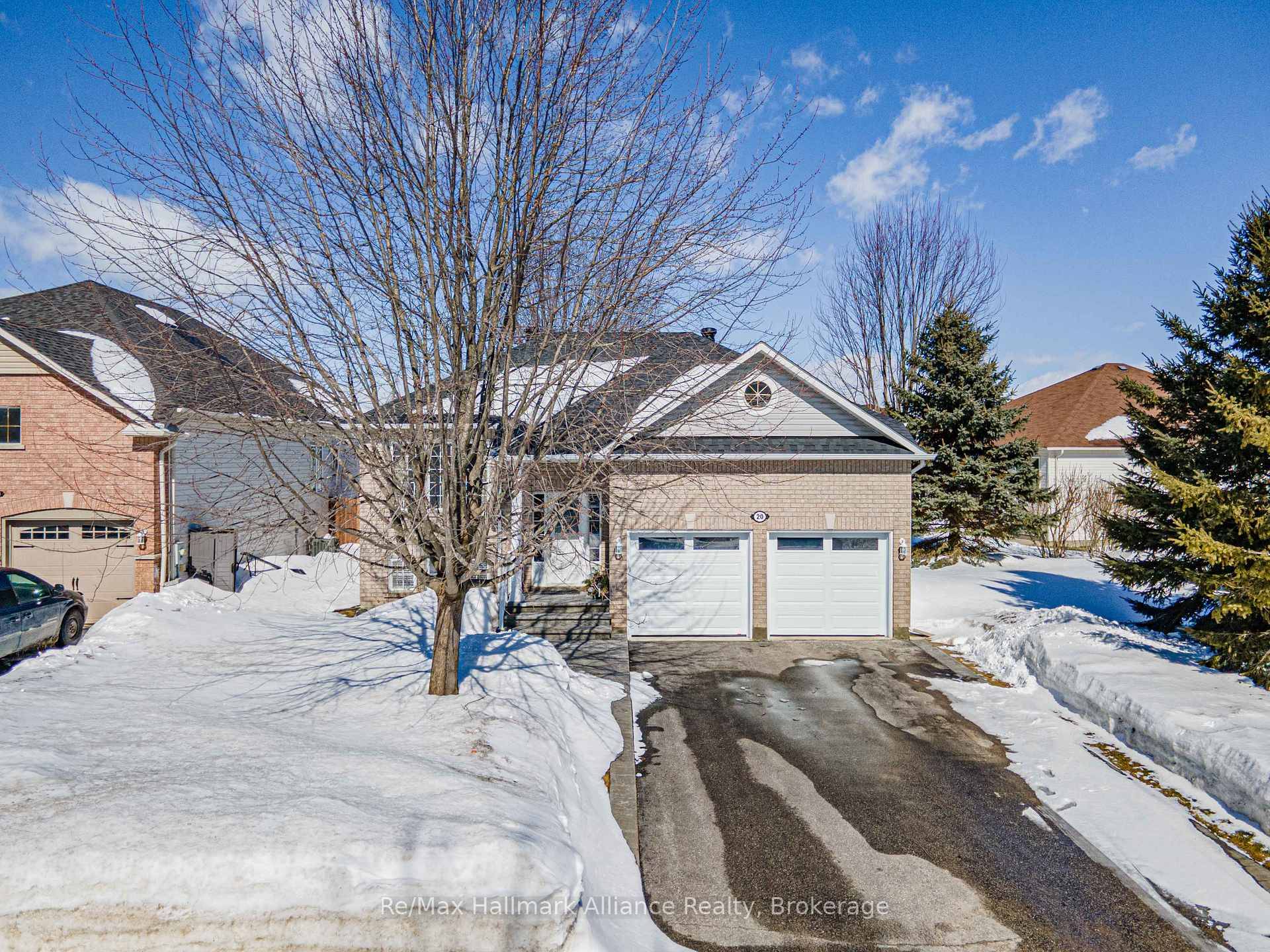 Welcome to this beautiful open concept raised bungalow in Wasaga Beachs desirable east end.