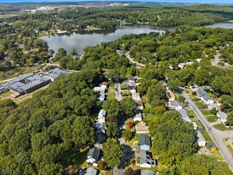 Welcome to this Charming Raised Ranch in the heart of White Meadow Lake !