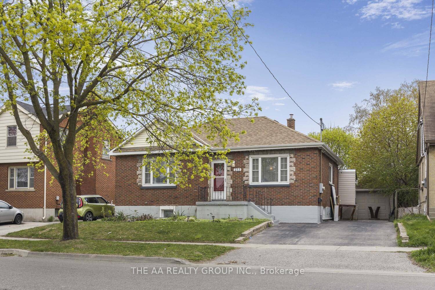 Charming 3 1 bed, 2 bath bungalow in Central Oshawa with a bright main floor, finished basement with walk out, and huge fenced yard.