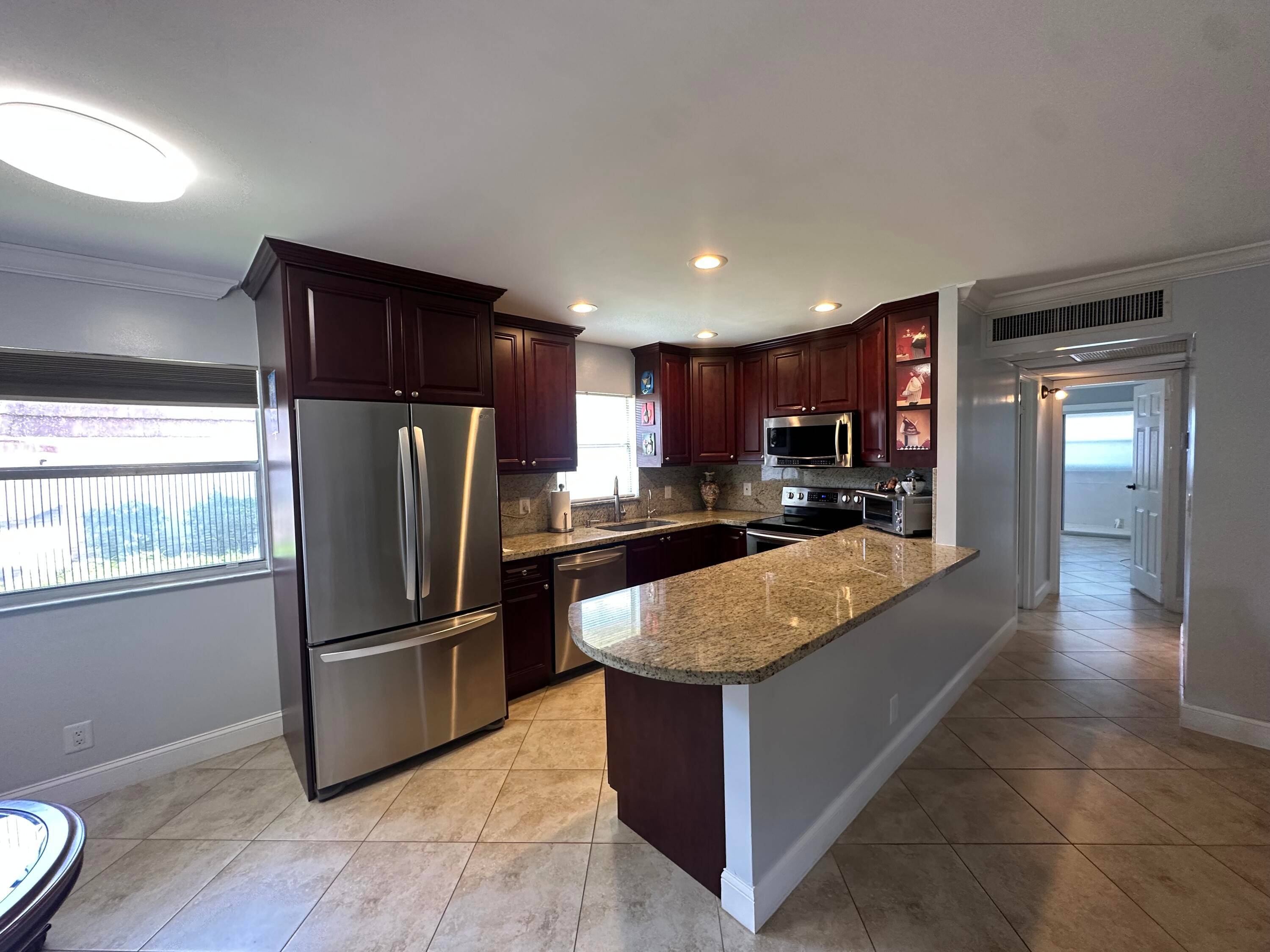Welcome to your beautifully renovated retreat in the vibrant 55 community of Kings Point !