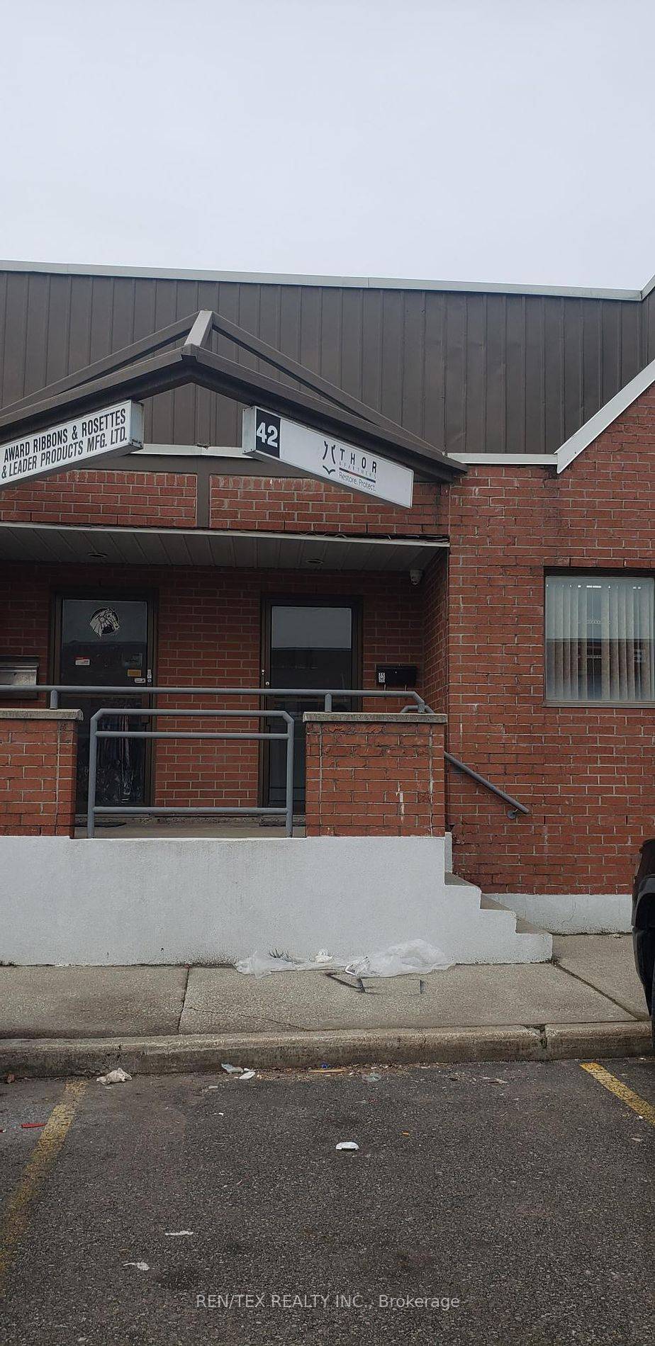 Industrial Unit With 2 Offices, Washroom, Warehouse With Drive In Shipping Door, Reserved Outside Storage Section At Rear, Bonus Storage Mezzanine Not Included In Sq.