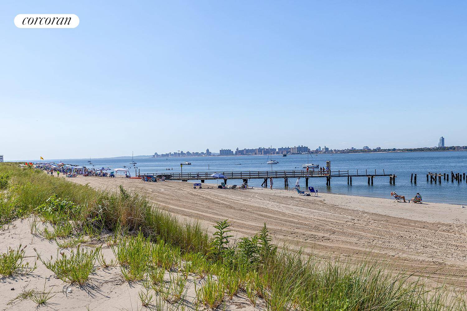 Located just steps from the bay, this summer home offers beautiful bay views and endless possibilities.