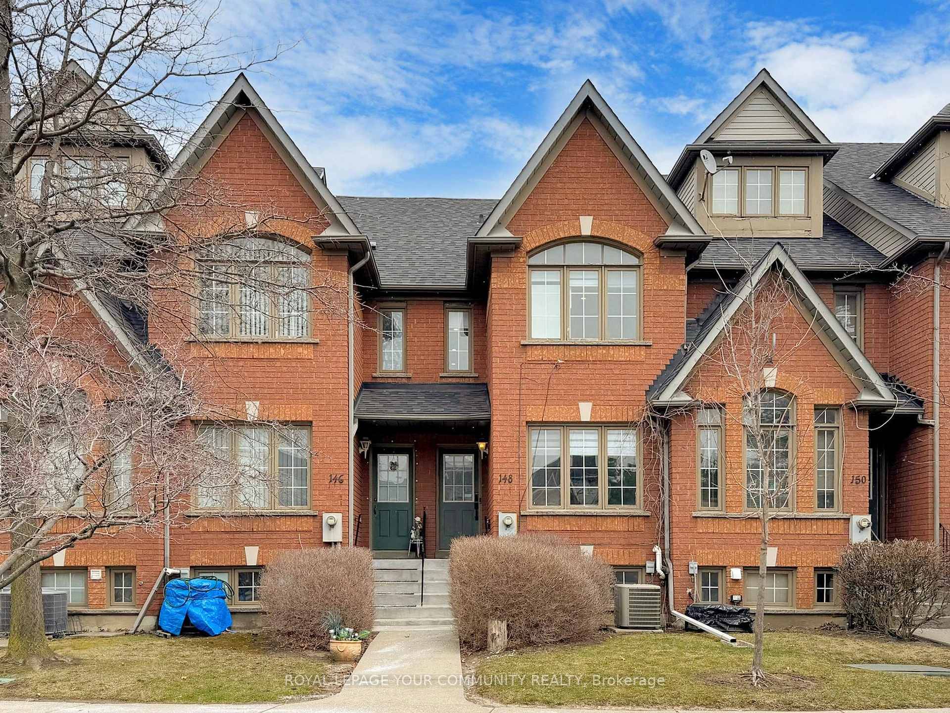 Welcome to this beautifully renovated condo townhome, tucked away in a quiet, family friendly enclave with a park nearby and green space right outside your front door.