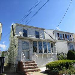 Totally renovated, legal duplex two family located on a quiet, tree lined street.