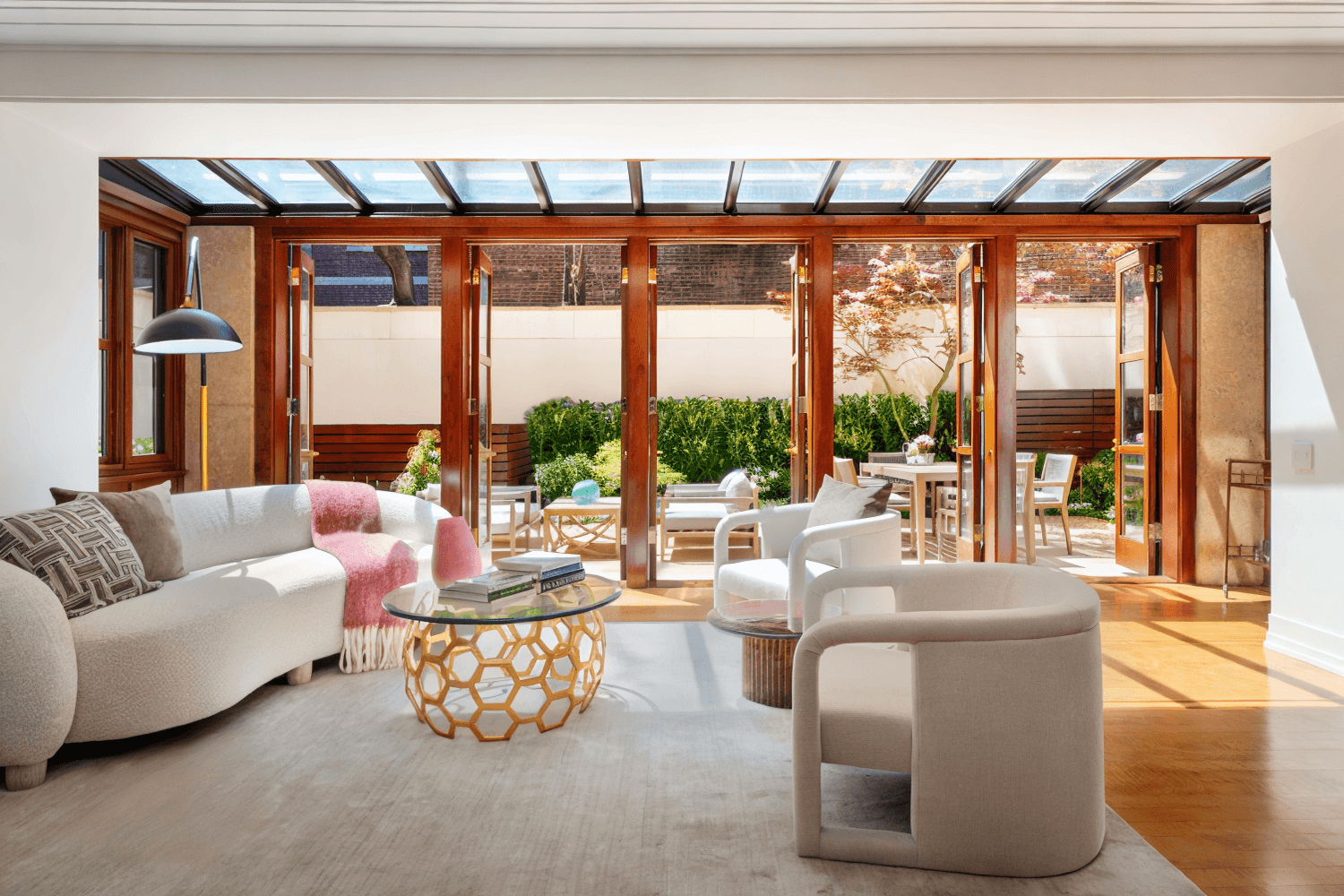 A Private Garden Retreat on the Upper East Side Enter your own serene oasis in this meticulously designed duplex condo which looks out on a sunny, south facing private garden.