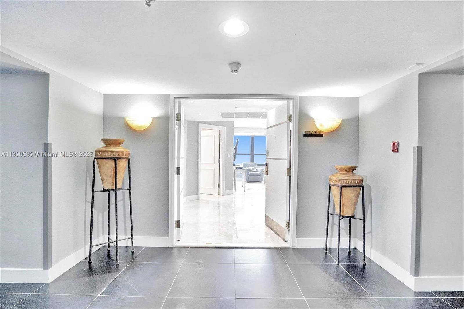 Enter through double doors into this bright south side, remodeled and fully furnished Penthouse.