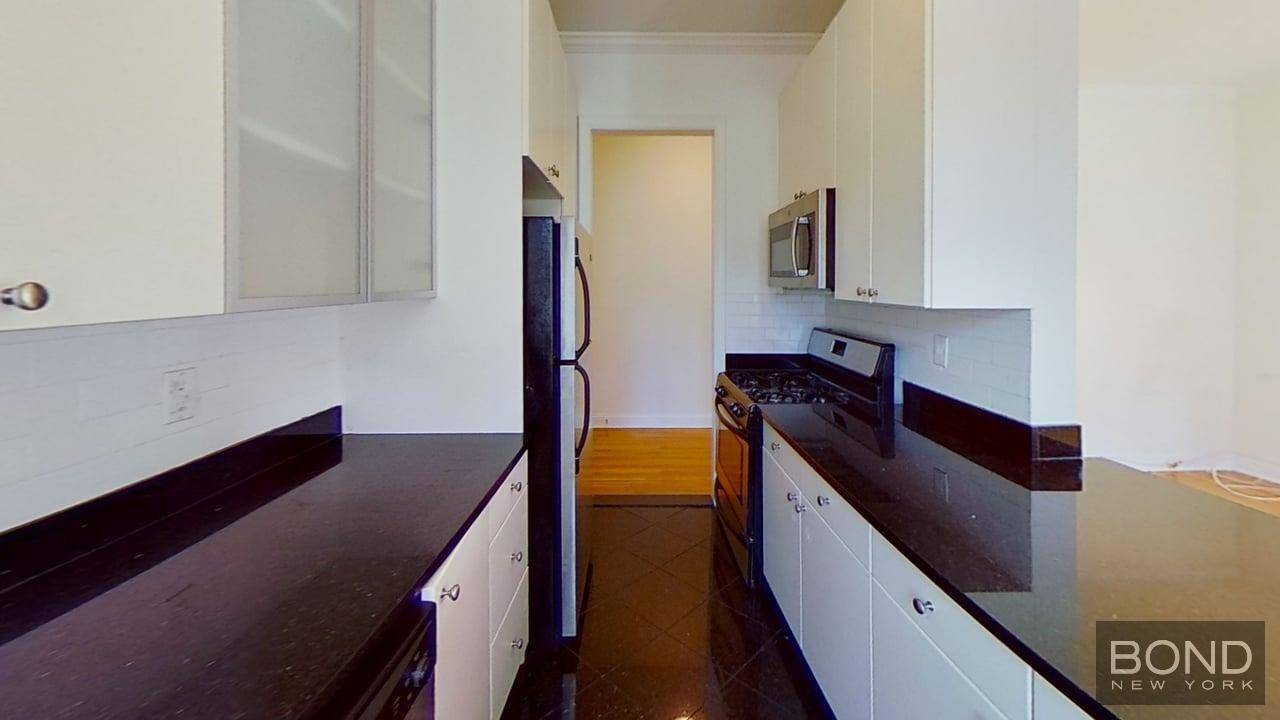 Stunning 2 bedrooms. Open large kitchen with marble counter top, white cabinets and Stainless Steel appliances.