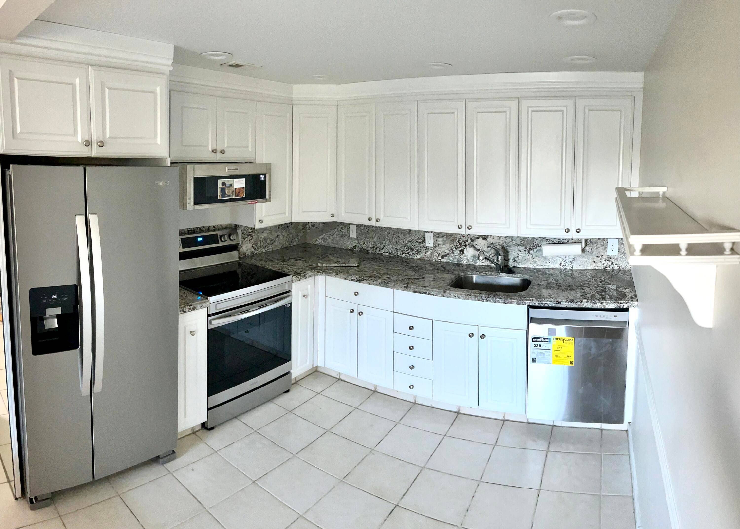 Beautifully remodeled 2 bedrooms, 2 bath condo in Century Village, best building location Lincoln B, 3rd floor overlooking expansive water view from both bedrooms thru sliders to enclosed Glass balcony.