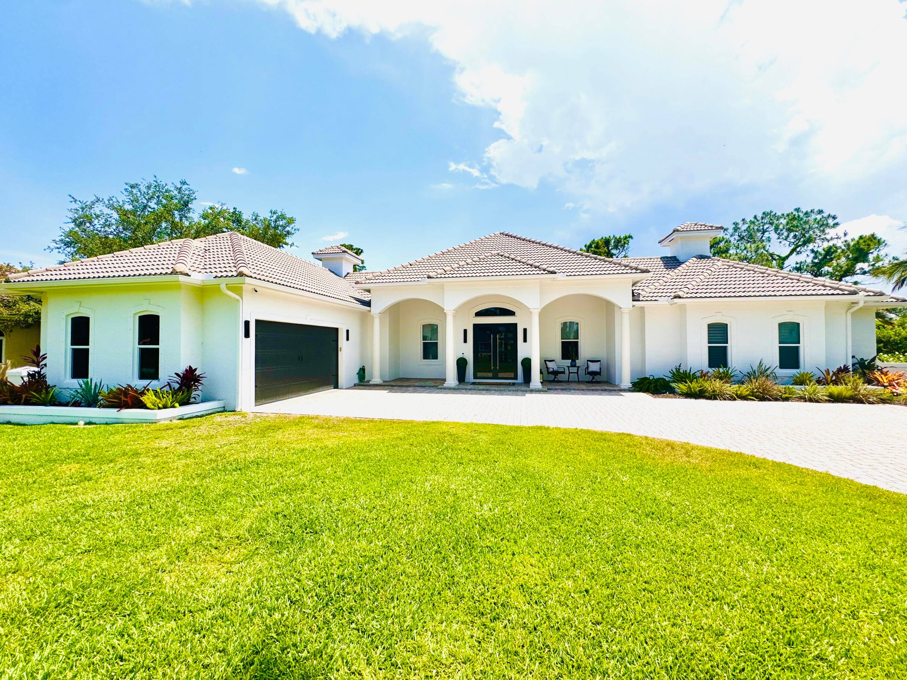 Beautiful 4 Bedroom 3. 5 bath, plus optional 5th bedroom gameroom and office home on the Second Green of the Prestigious Cape Club golf course !