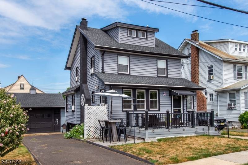 This beautifully renovated colonial sits on a LARGE CORNER LOT.